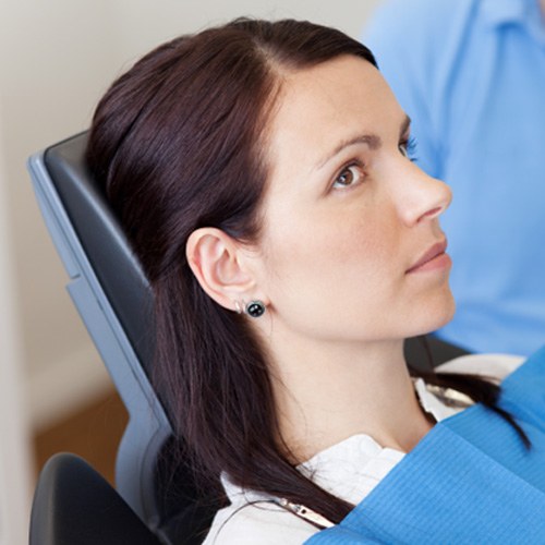 Close-up portrait of concerned dental patient